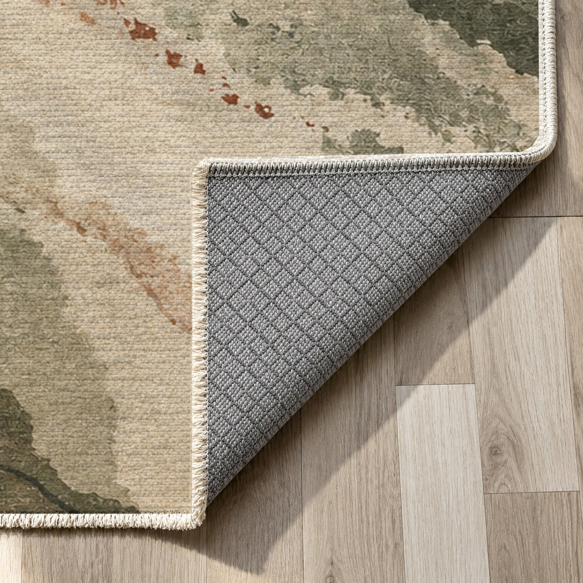Tidal Traces Sage Clay Abstract Washable Rug — backing close up
