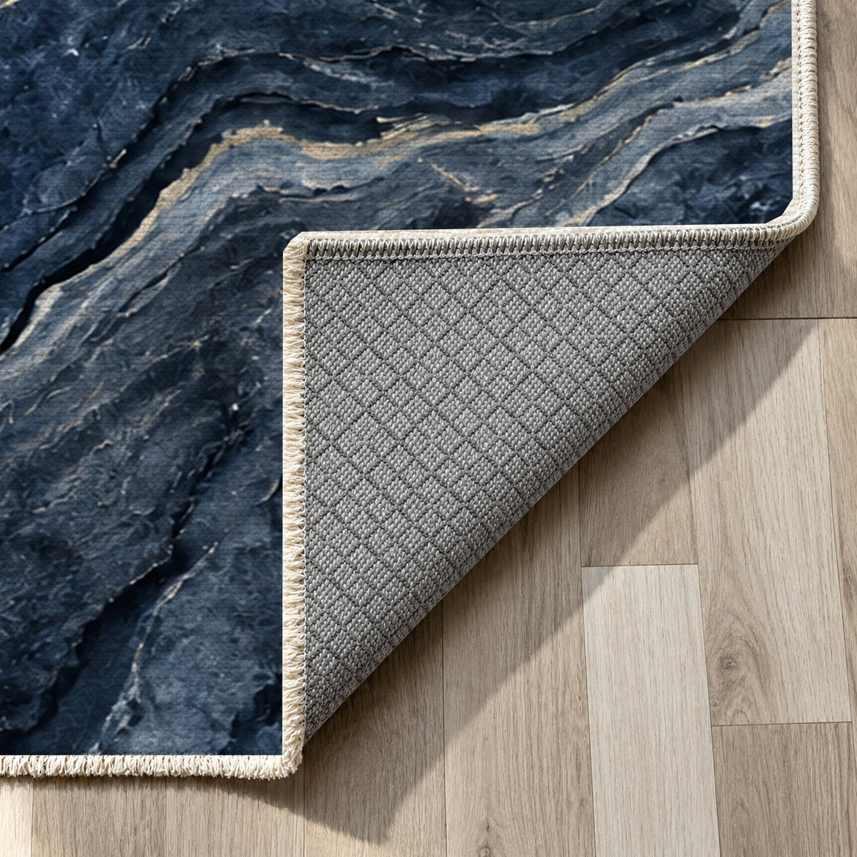 Volcanic Flow Indigo Abstract Washable Rug — backing close up