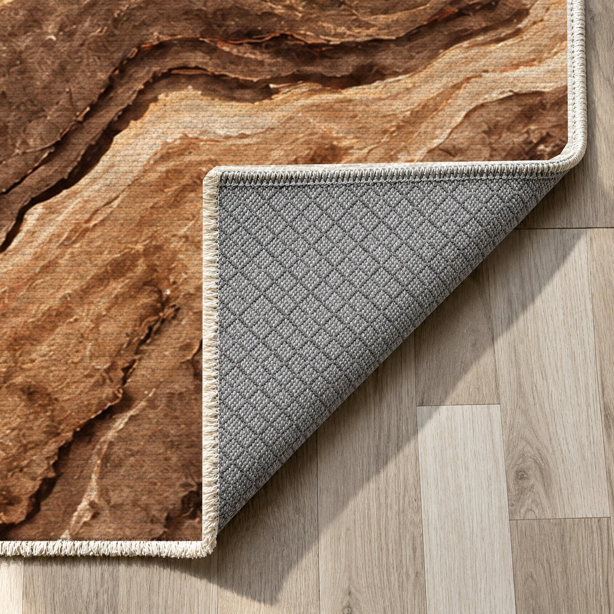 Volcanic Flow Terracotta Abstract Washable Rug — backing close up