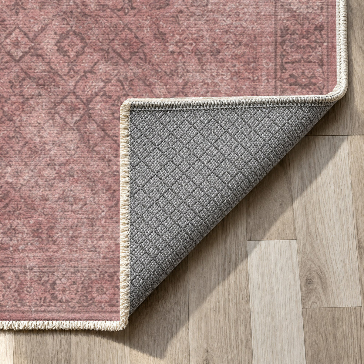 Washed Herati Rose Pink Vintage Washable Rug — backing close up