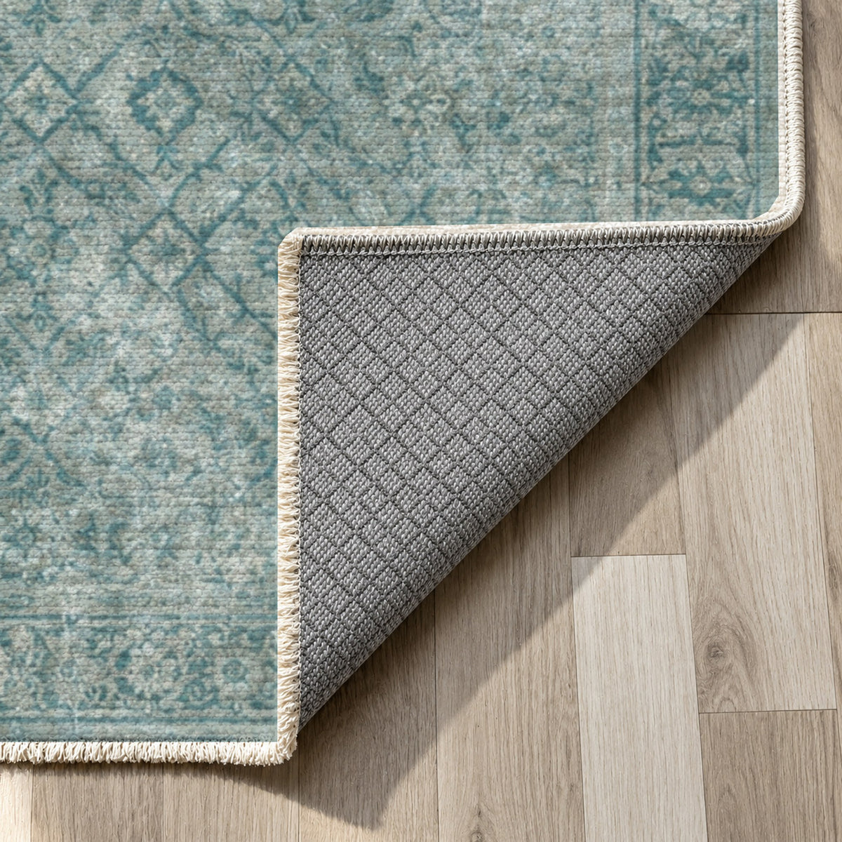 Washed Herati Turquoise Blue Vintage Washable Rug — backing close up