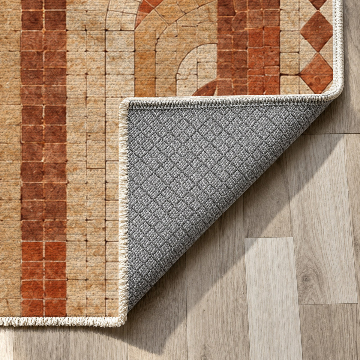 Weathered Arches Terracotta Geometric Washable Rug — backing close up