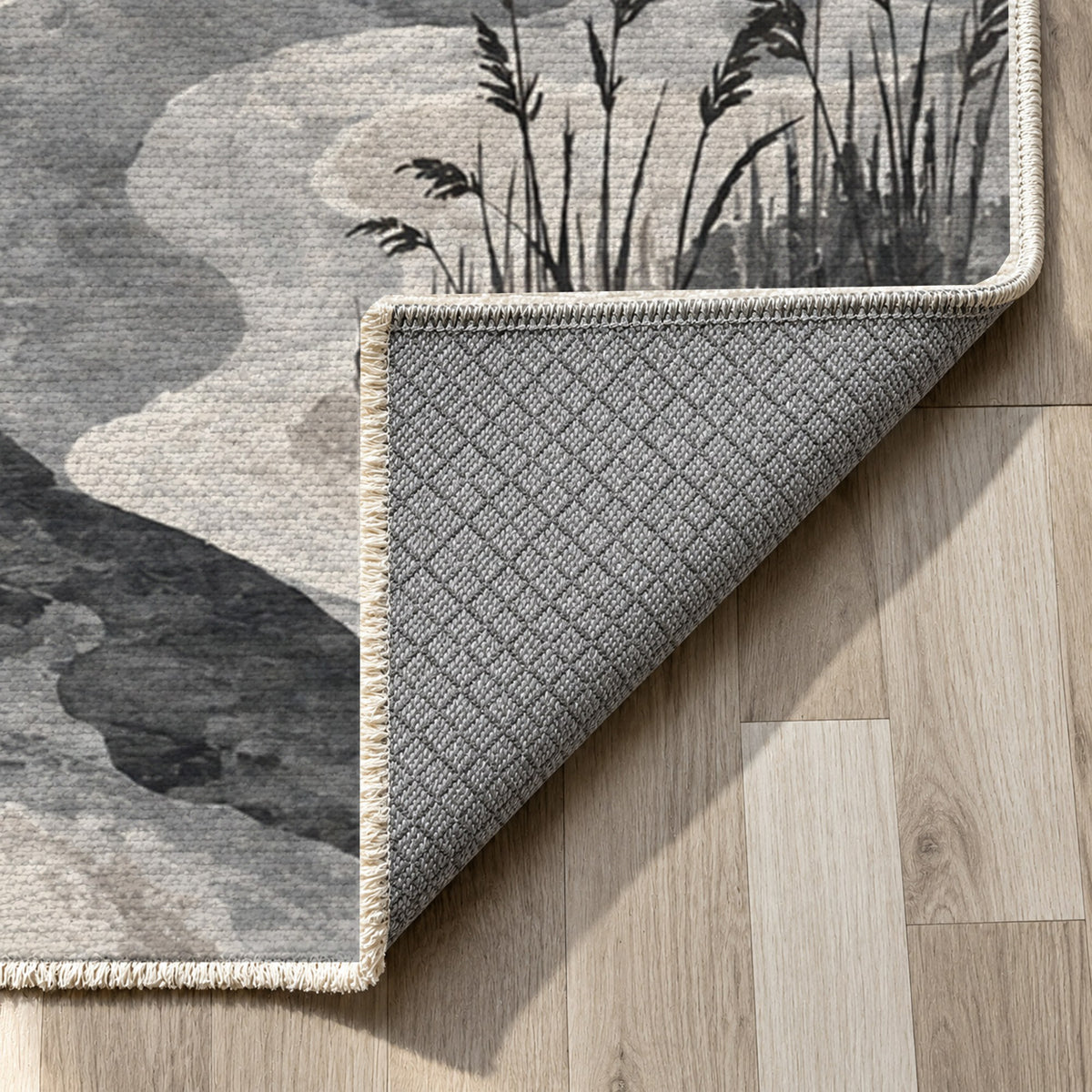 Wetland Reeds Charcoal Abstract Washable Rug — backing close up