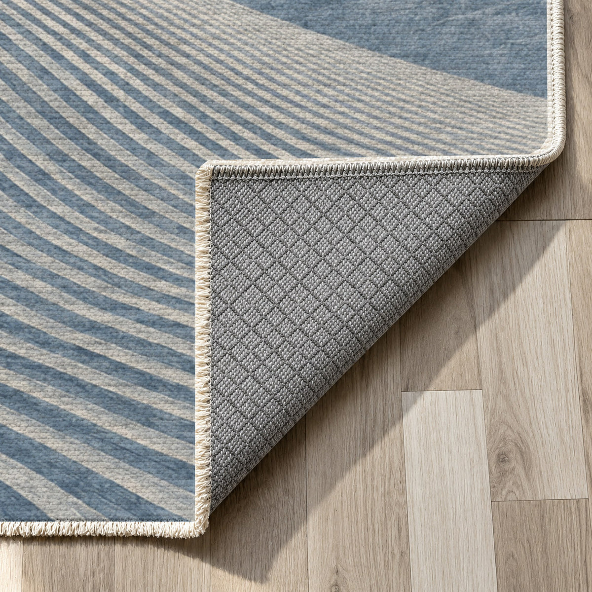 Wind Lines Indigo Modern Washable Rug — backing close up