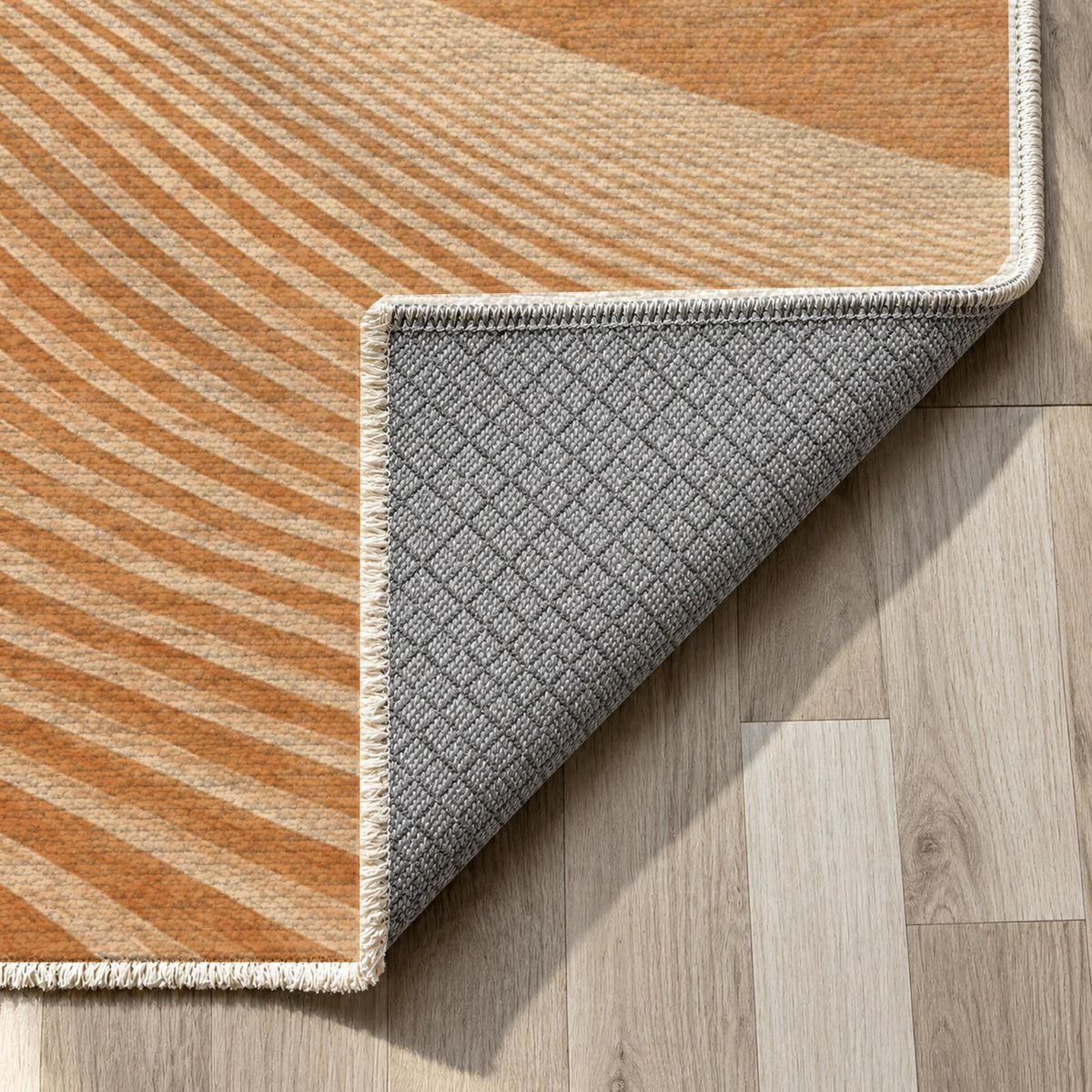 Wind Lines Terracotta Modern Washable Rug — backing close up