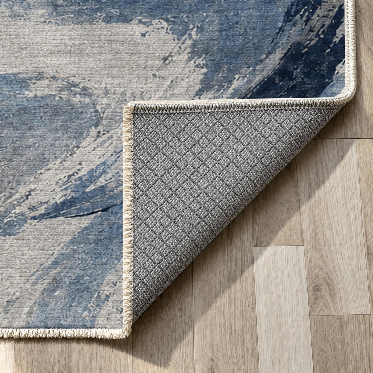 Wind Script Blue Grey Abstract Washable Rug — backing close up