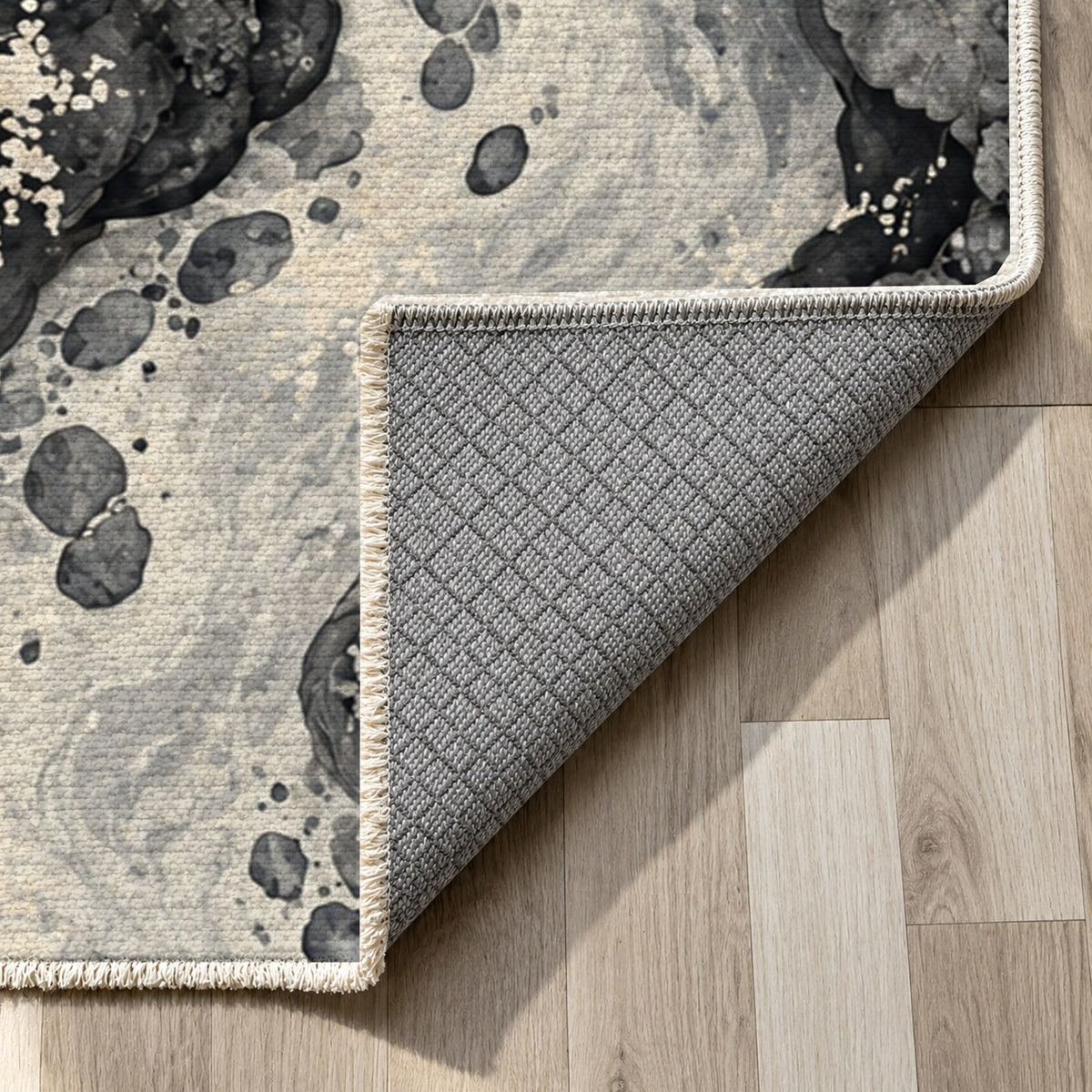 Woodland Stream Charcoal Floral Washable Rug — backing close up
